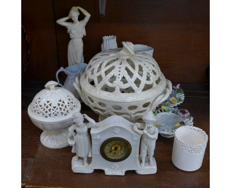 Two pierced creamware lidded bowls, marked Leeds ware and Wedgwood, a figural clock, two vases, a figure, etc., (10)