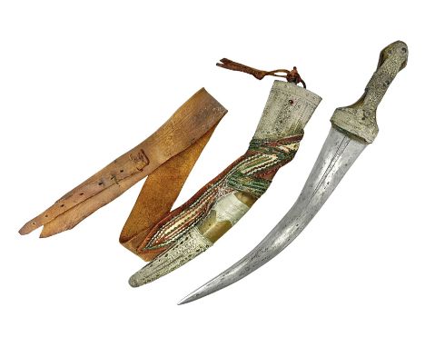 Saudi Arabian khanjar dagger with 29.5cm curving double edged  steel blade; white metal and copper mounted horn grip; in whit