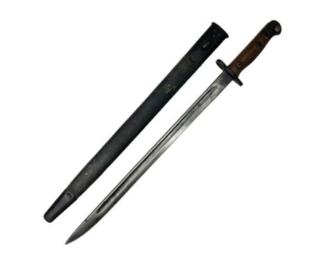 WWI British 1907 pattern bayonet, the 43cm fullered blade by Wilkinson with various marks to the ricasso; in leather covered 