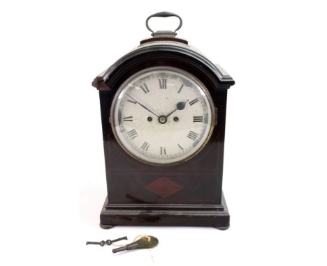 A George III style mahogany boxwood strung domed top bracket clock, late 19th century, with brass carrying handle, the white 