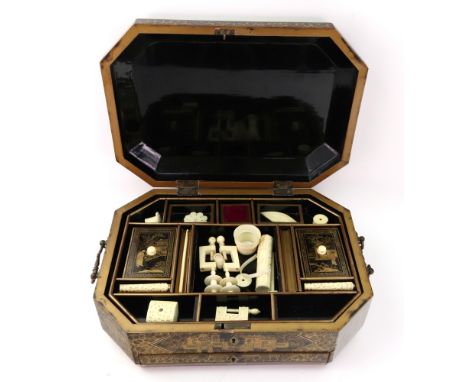 A Chinese Export black lacquer chinoiserie decorated sewing box, 19th century, of octagonal form, the hinged cover enclosing 