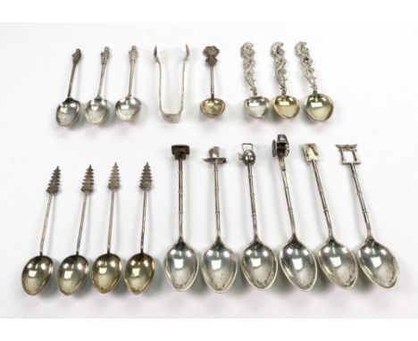 A collection of eighteen Chinese tea and coffee spoons, mostly detailed sterling, first half 20th century, with varying capit