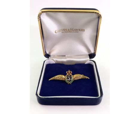 A 9ct gold and enamel Royal Navy Fleet Air Arm badge, Birmingham 1993, makers mark JWB, 43mm long, 3.9g gross.