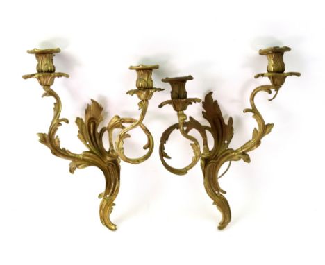 A pair of Louis XV style gilt metal applique, first half 20th century, cast with acanthus, stamped N.8019, 32cm high.
