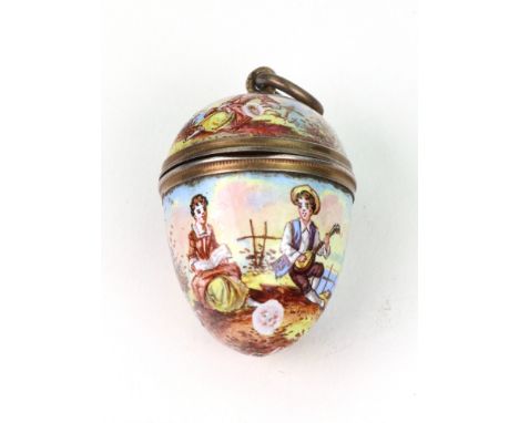 A Viennese silver gilt and enamel egg shape vinaigrette, circa 1900, makers mark S G, the hinged cover and sides painted with