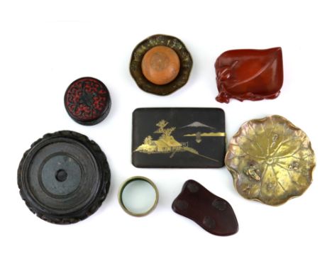 A group of Asian works of Art, various dates, including: a Chinese cloisonne napkin ring, a small Chinese ivory rectangular p