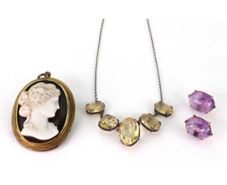 A hardstone cameo portrait of a lady in a gold frame (a.f), a pair of gold and cabochon amethyst earrings (cased), and a citr