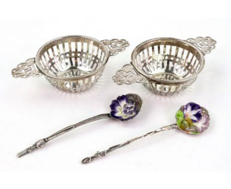 A pair of late Victorian silver quaich style bon bon dishes, William Comyns, London 1899, with pierced sides and handles, 12c