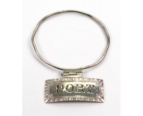 A George III silver bottle ticket, 'PORT', Thomas Phipps, Edward Robinson & James Phipps, London 1815, the curved rectangular