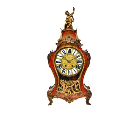 A Louis XV gilt metal mounted scarlet tortoiseshell and cut brass 'Boulle' marquetry bracket clock and bracket, the waisted c