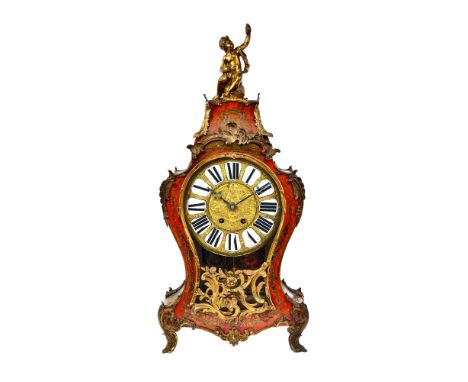 A Louis XV gilt metal mounted scarlet tortoiseshell and cut brass 'Boulle' marquetry bracket clock and bracket, the waisted c