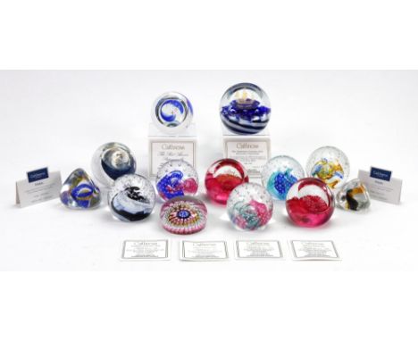 A collection of thirteen modern Caithness glass paperweights, Collectors Club Reflections 91-95, Red Arrows, Christopher Colu