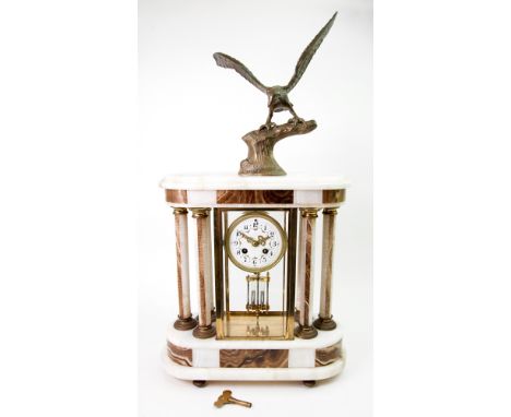 An early 20th century gilt metal mounted white onyx marble and agate portico clock, the dial painted with floral swags in a f