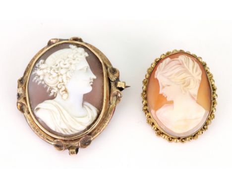 A Victorian gold and oval portrait shell cameo brooch (a.f), and a 1950's shell cameo brooch in gilt metal frame (2).
