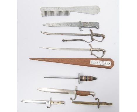 A collection of 8 paper knives, 4 in the form of WWI bayonets, 2 of Imperial German officers' sword style; one from the teak 