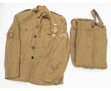 A good WWI US Army NCOs uniform, khaki light weight material, jacket with all insignia and US Victory medal, en suite breeche