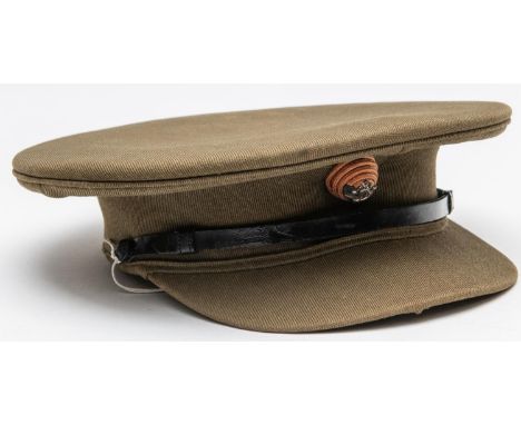 A WWI Officers SD cap of the K.R.R.C., with red boss, bugle horn badge and buttons, black leather chinstrap. GC £70-80