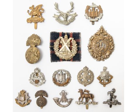 15 Infantry cap badges, including pre 1920 Queens, pre 1935 Northumberland Fusiliers, East Surrey with QVC and slider, pre 19