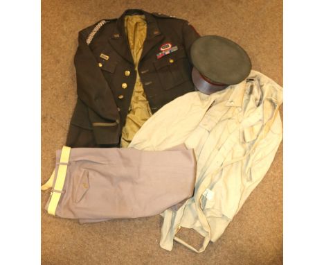 A WWII US Army officers uniform, comprising: peaked SD cap, "Chocolate" jacket with General's stars and 82nd Airborne patch e