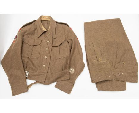 A good 1940 patt khaki BD blouse, Middlesex Regt, 3rd Div insignia, label dated 1942; also a pair of utility patt khaki BD tr