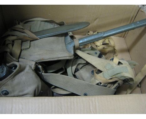 A set of WWII US Infantry webbing equipment, comprising waist belt, suspenders, water bottle, entrenching tool, pistol holste