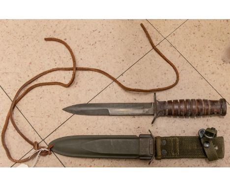 Image of Fighting or survival knife with scabbard and webbing leg strap, by  British School, (20th century)