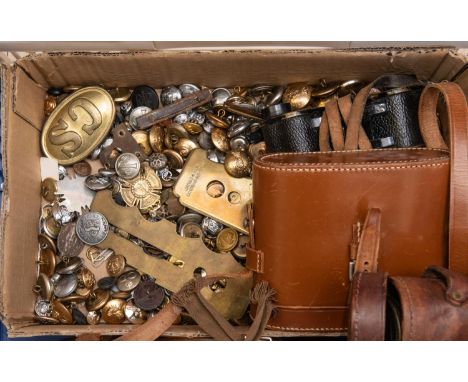 A pair of WWII British army binoculars; a WWII military clinometer in its leather case; a pair of 19th century military field