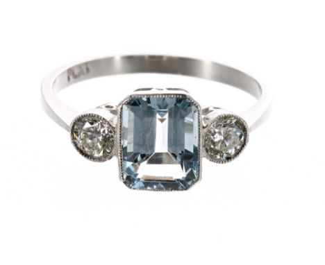 Platinum aquamarine and diamond three stone ring, the aquamarine 1.40ct, with round brilliant-cut diamonds to either side, 0.