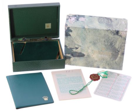Vintage Rolex green box with outer cardboard cover, with tag and wallet with Chronometer certification paper and a 1973 calen