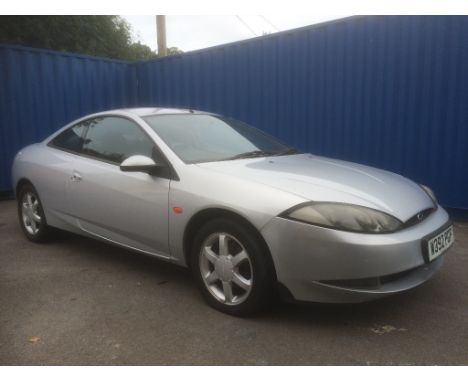 A 2000 Ford Cougar V6 Pack coupé, registration number W392 PGF, silver. With less than 71,000 miles from new, this top of the