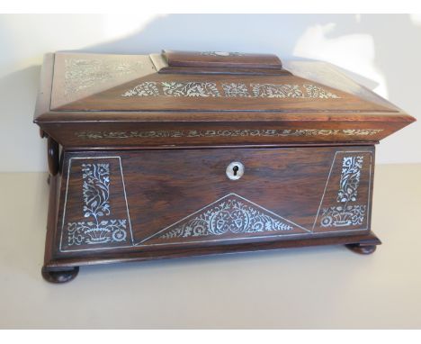 A rosewood 19th Century tea caddy inlaid with mother of pearl side handles - 20cm tall x 36cm x 20cm 