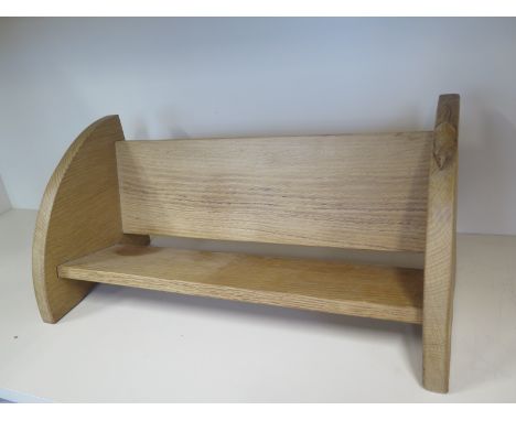 A Robert Thompson of Kilburn "Mouseman" book/storage trough with typical carved mouse - 20cmtall x 46cm x 20cm - current Robe