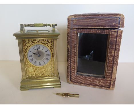 A good quality 19th Century French brass carriage clock by E Maurice & Co, striking on a gong with repeat having a silvered c