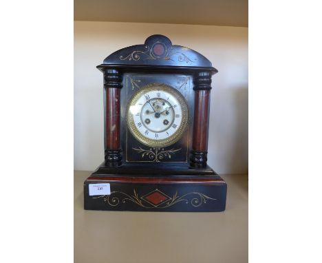 A good quality 19th Century marble mantle clock, eight day movement with an open escapement, striking on a gong with key pend