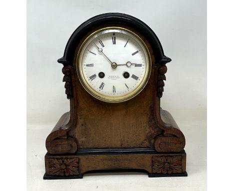 A mantel clock, by Aubert & Co, with an eight day movement, in a walnut case, 25 cm high 