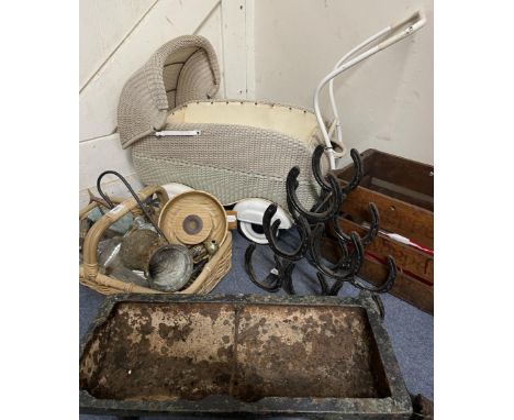 A cast iron animal trough, a wine holder in the form of horseshoes, a doll's pram and other items (qty) 