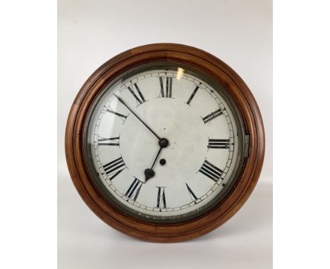 A wall clock, in a mahogany case, 40 cm diameter 