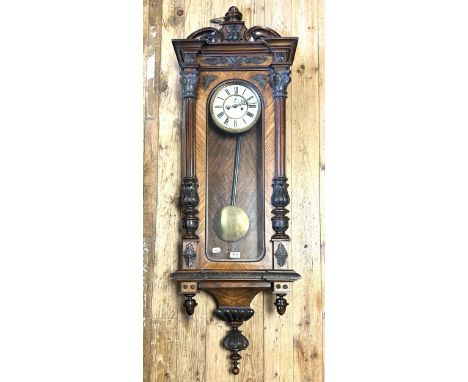 A Vienna regulator style wall clock, in a walnut case, 152 cm 