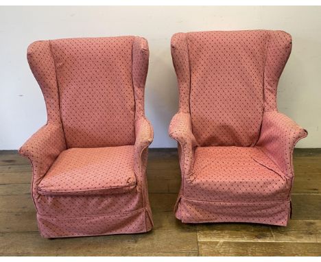 A pair of Parker Knoll type wingback armchairs, another, a mirror, a two tier trolley, a two tier table, a magazine rack, a s