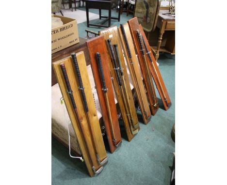 Collection of eight mounted golf clubs, to include, Ben Sayer's 'Benny' putter, Rangefinder putter, Geo. Duncan 'The Akros Mo