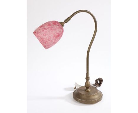 Brass reading lamp, with mottled puce and white glass shade mounted to a curved arm and circular base, 49cm high