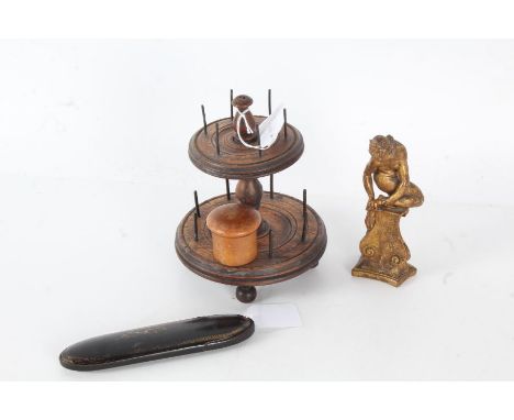 19th century turned walnut bobbin stand, 17cm tall, together with a treen pin pot and over, a Victorian papier mache lorgnett