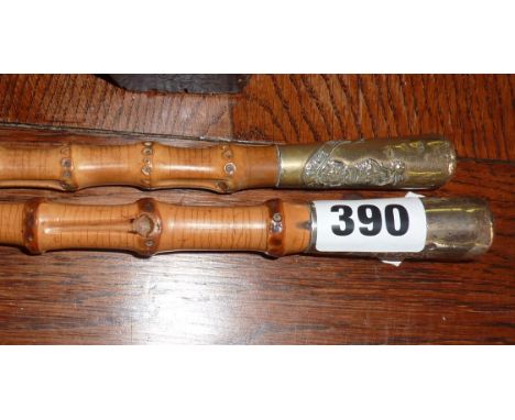 The Loyal North Lancs Regiment silver topped bamboo swagger stick and a similar with silver-plated top