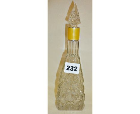 Tall cut glass scent bottle with yellow guilloche enamel collar