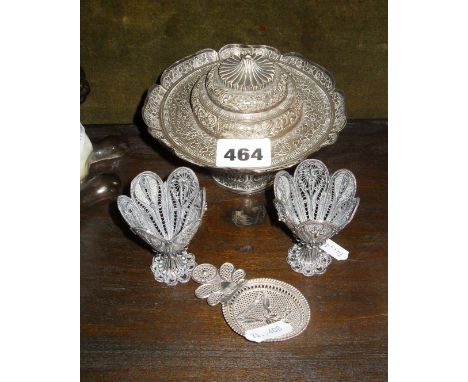 Early 20th c. Indian silver wirework egg cups (2), a similar caddy spoon and an antique Tibetan silver cup stand with lid