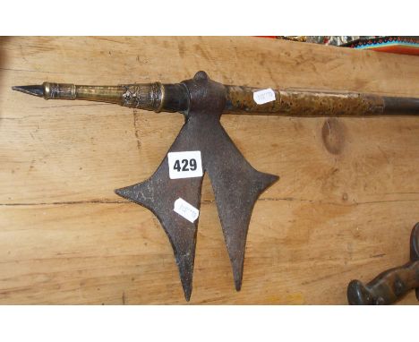 19th c. Indo Persian Islamic Bullova or Tongi steel-bladed fighting or war axe from Chota Nagpur in India, with ornate brass 