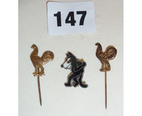 A Sterling silver enamel Felix the Cat badge, c. 1930's, and two Courage Brewery cockerel lapel badges