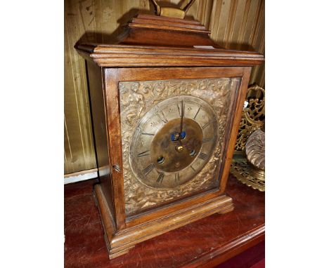 Victorian bracket type mantle clock in walnut case, the movement having 18th c. brass dial with silvered chapter ring