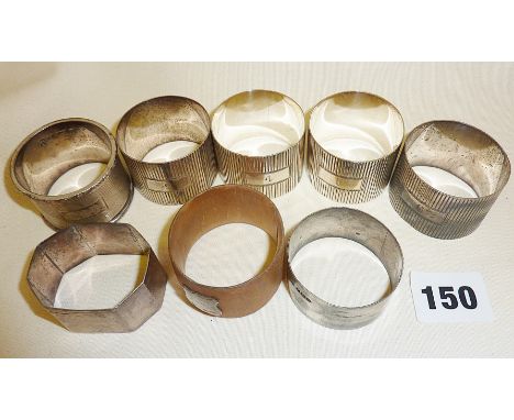 Seven silver napkin rings, inc. a set of 4 by Walter & Barnard hallmarked for London 1886, another heavy by C.J. Vander, and 