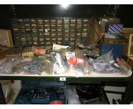 A shelf of storage boxes containing screws etc. &amp; a quantity of miscellaneous packets etc.